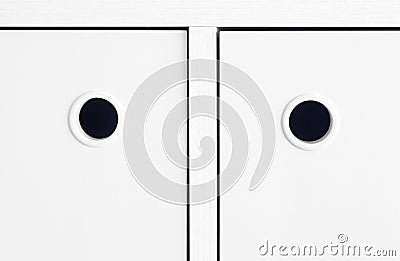 White handle cabinet Stock Photo