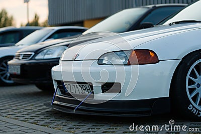 White Honda Civic V car with tuning for racing parked outdoors during the daytime Editorial Stock Photo