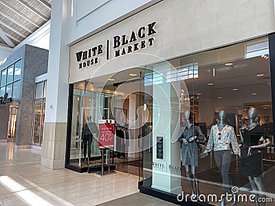 A White House Black Market retail clothing store in an indoor mall in Orlando, FL Editorial Stock Photo