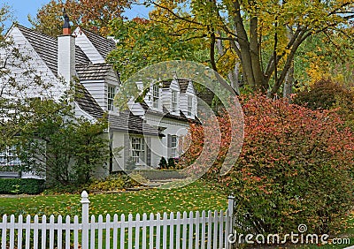 White house with gables and dormer windows Stock Photo