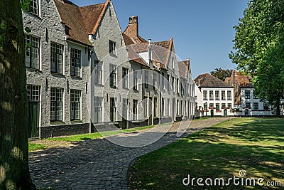 The White houses of Beguinage in Bruges, Belgium Stock Photo