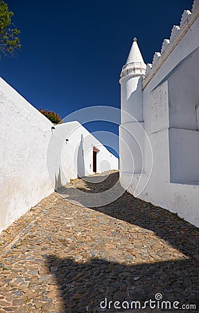 A Street with white houses in the small town of Mertola. Portugal Stock Photo