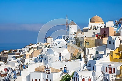 White Houses and Windmills on a Mountainside Stock Photo