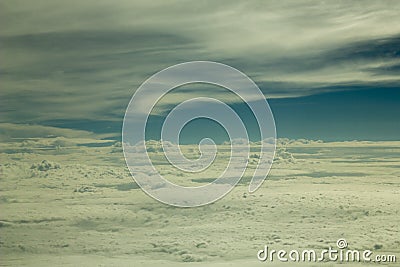 A White infinite valley of clouds against the blue sky and lines of clouds, view from a great height. only sky Stock Photo