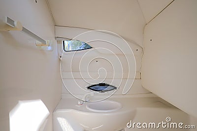Interior restroom toilet inside motor boat Stock Photo