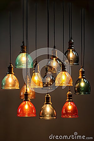 White isolated cutout Vintage hanging light with a yellow light bulb inside of it Stock Photo