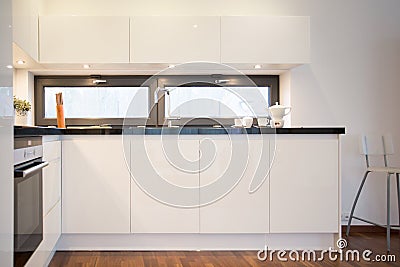 White kitchen cupboards Stock Photo