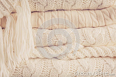 White knits pile. Warm cozy home concept Stock Photo