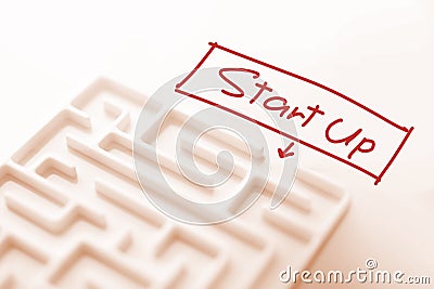 White labyrinth and focus text start up. Stock Photo