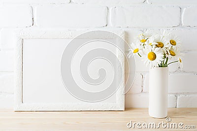 White landscape frame mockup with daisy flower in styled vase Stock Photo