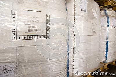 White large containers for bulk material on pallets Stock Photo