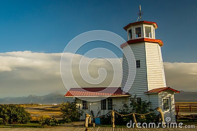 White lighthouse in town of Homer, Kenai Peninsula, Alaska Stock Photo