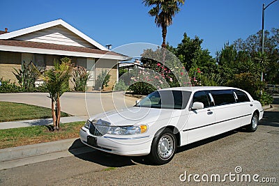 White limousine at driveway Stock Photo