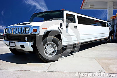 White limousine on gas station Stock Photo