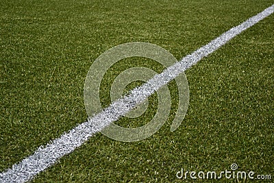 White line on green artificial turf soccer field Stock Photo