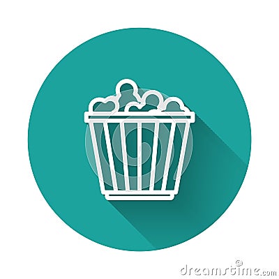 White line Popcorn in cardboard box icon isolated with long shadow. Popcorn bucket box. Green circle button. Vector Vector Illustration