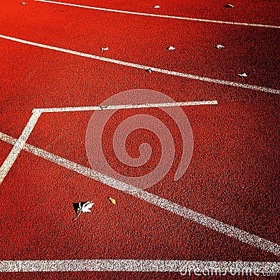 White lines on red playground Stock Photo