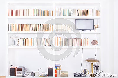 White living room with modern wooden bookshelf Stock Photo