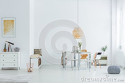 White loft with dining table Stock Photo