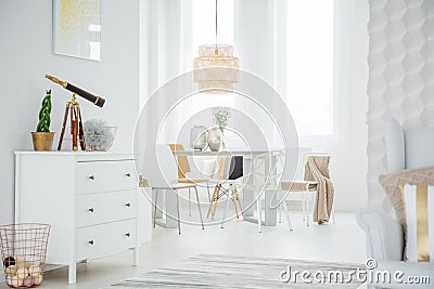 White loft interior with dresser Stock Photo