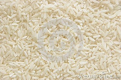 White long rice background, uncooked raw cereals, large detailed texture pattern macro closeup, horizontal textured copy space Stock Photo