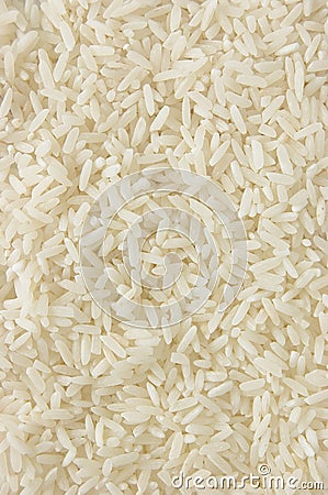 White long rice background, uncooked raw cereals texture, detailed vertical textured macro closeup Stock Photo