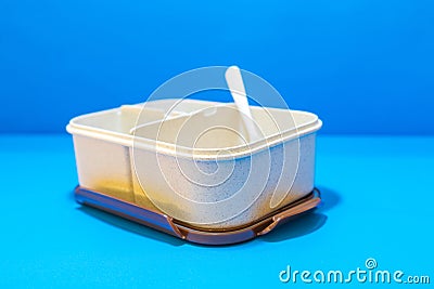 White Lunch Box with Brown Lid and Three Compartments Stock Photo