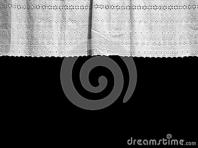 White lace curtain with small flower pattern at the window Stock Photo