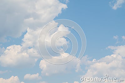 White magnificent cumulus clouds on a blue sky, Stock Photo