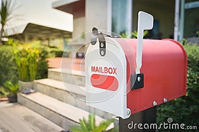 White Mail Box in Front of a House Stock Photo