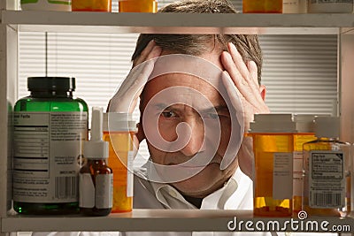 White male with prescription drugs Stock Photo