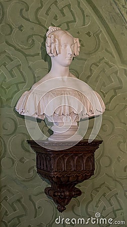 White marble bust of Louise of Orleans in the Green Room of the Pena Palace in Sintra, Portugal. Editorial Stock Photo