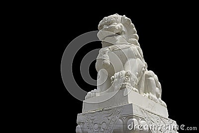 White marble Chinese guardian lion sculpture on black background with clipping path Stock Photo