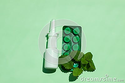 White medical nasal spray bottle,a remedy against allergies and runny nose, colds, viral diseases Stock Photo