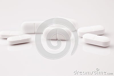 White medicine tablets, antibiotic pills Stock Photo