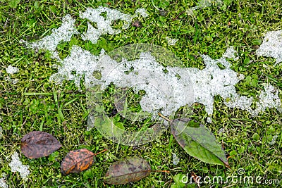 Abstract phot from the fallen first snow on the ground. Stock Photo