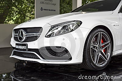 TURIN, ITALY - JUNE 9, 2016ï€¢ A white Mercedes AMG C63 S CoupÃ¨ on display at Turin open air car show Editorial Stock Photo