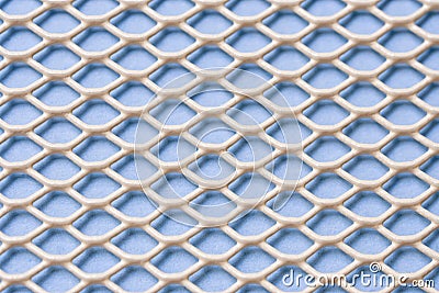 White metal mesh with small cells on a blue background. Close-up. Macro. Industrial background Stock Photo