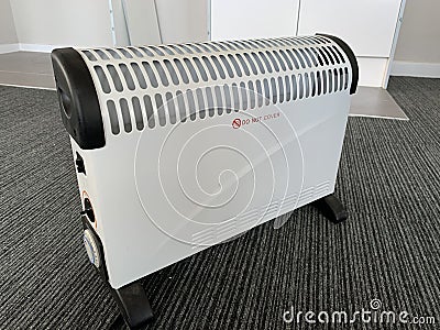 White metallic portable electric heater Stock Photo