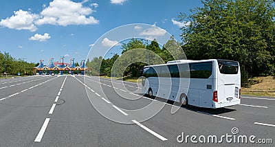 White Modern comfortable tourist bus driving through highway to Disneyland. Editorial Stock Photo