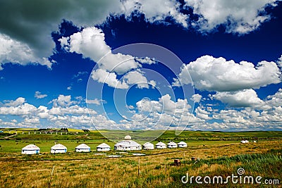 The white mongolia yurts on the Hulunbuir grassland. Stock Photo
