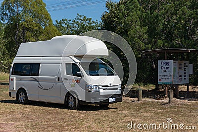 White motorhome, campervan vehicle parked at information sign at Fogg Dam Editorial Stock Photo