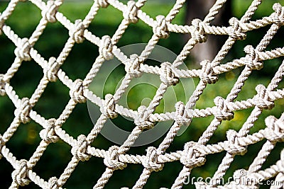 White net in the rope adventure park in the summer. Close up. Active sport life Stock Photo