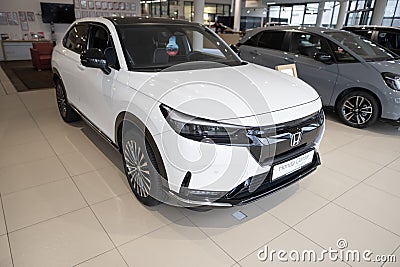 white new Honda e:Ny1 Electric Car, Japanese transnational corporation Honda Motor in showroom, sustainable development EV, Editorial Stock Photo