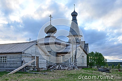 White nights on the Kola Peninsula. Old wooden Church in the village of Varzuga Stock Photo