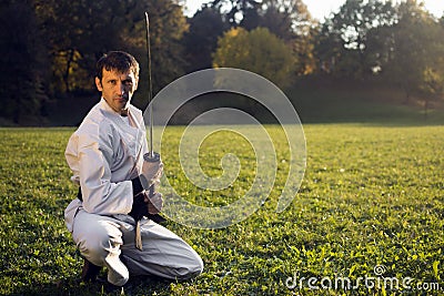 White ninja with sword Stock Photo