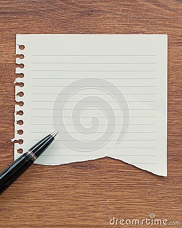 White note paper and black pen on wooden table Stock Photo