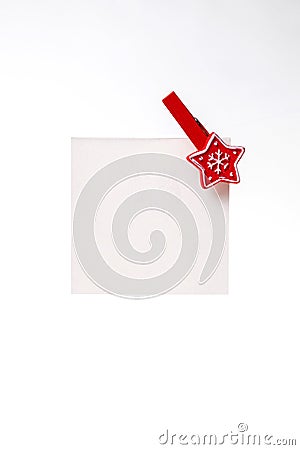 white note with a red Christmas clothespin . copy space Stock Photo