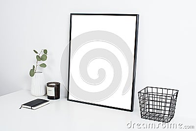 white office interior, stylish work table space with poster artw Stock Photo