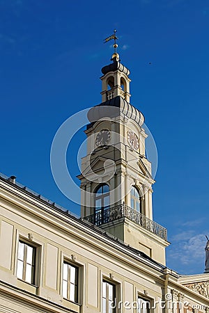 White old clock tower in the Gothic style, Riga. Stock Photo